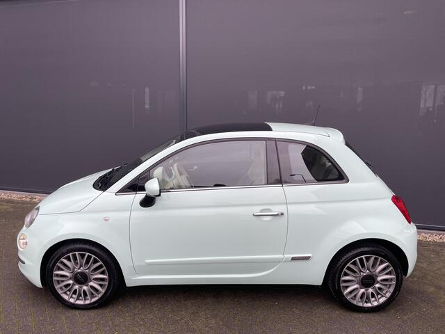 Fiat 500 0.9 TwinAir Turbo Collezione met schuif/kanteldak Airco - Cruise control - parkeersensor achter - Navigatie - Panoramadak - Schuif/kantel dak - Mistlampen voor - Licht metalen velgen 16 inch - Stuur multifunctioneel - Radio - Bluetooth - Sta