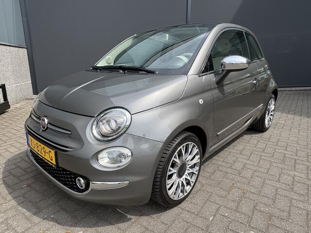 Fiat 500C 0.9 TwinAir Turbo Lounge Automaat Glazen panoramadak - Airco - Navigatie - Parkeersensor achter - Licht metalen velgen 15 inch - Cruise control - Mistlampen - Elektrische ramen - Stuur multifunctioneel - Bluetooth - Centrale vergrendeling met afstandsbedi