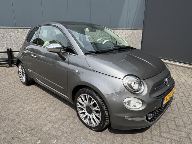 Fiat 500C 0.9 TwinAir Turbo Lounge Automaat Glazen panoramadak - Airco - Navigatie - Parkeersensor achter - Licht metalen velgen 15 inch - Cruise control - Mistlampen - Elektrische ramen - Stuur multifunctioneel - Bluetooth - Centrale vergrendeling met afstandsbedi