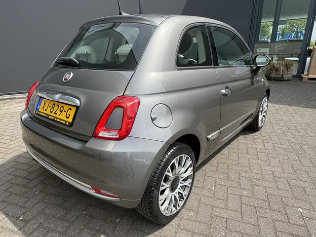 Fiat 500C 0.9 TwinAir Turbo Lounge Automaat Glazen panoramadak - Airco - Navigatie - Parkeersensor achter - Licht metalen velgen 15 inch - Cruise control - Mistlampen - Elektrische ramen - Stuur multifunctioneel - Bluetooth - Centrale vergrendeling met afstandsbedi