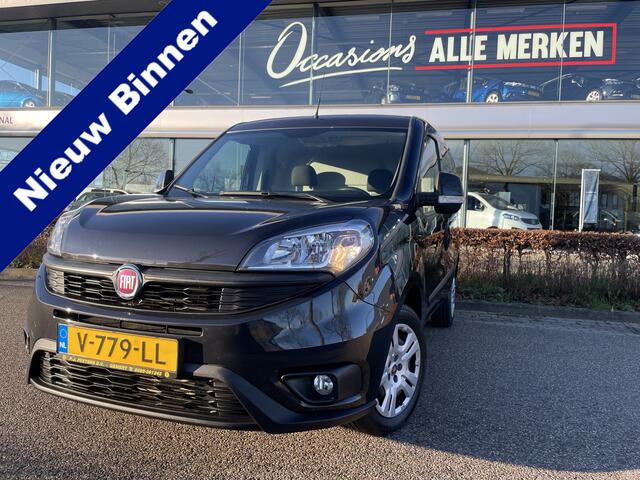 Fiat DOBLO Cargo 1.6 MJ L1H1 SX Airco - Bluetooth - Parkeersensoren achter - Radio - Tussenschot volledig - Zijschuifdeur rechts - Stuur multifunctioneel - Mistlampen voor - Elektrische ramen voor