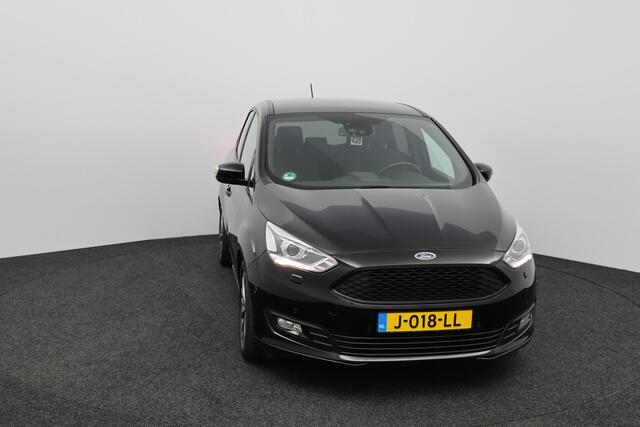 Ford C-MAX 1.0 Titanium Sport/ 17'' LMV/ Bi-Xenon/ Voorruitverw./ Dakspoiler/ Camera/ PDC V+A/ Keyless-GO/ Stoel + Stuurverw./ Apple Carplay/ Zwarte-Hemel/ Extra getint glas/ 6-Bak.