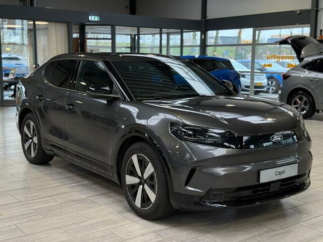Ford CAPRI Extended Range RWD 77 kWh | Warmtepomp | Adapt. Cruise | Elek. achterklep | Winter Pack | El. verst. stoel + geh. + mass. | garantie tot 08/2028 |