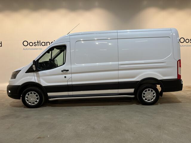 Ford E-Transit 350 L3H2 Trend 68 kWh 184 PK / 100% Elektrisch !! / Airco / Cruise Control / CarPlay / Camera / Navigatie / 3-Zits / NIEUW !!