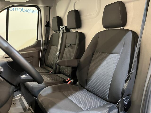 Ford E-Transit 350 L2H2 Trend 68 kWh 184 PK / 100% Elektrisch !! / Airco / Cruise Control / CarPlay / Camera / Navigatie / 3-Zits / 12.200 KM !!