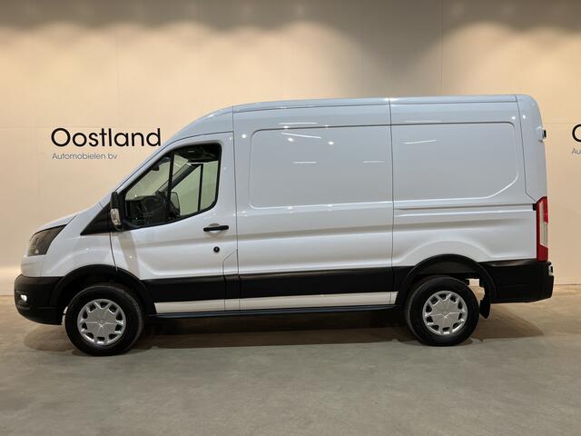 Ford E-Transit 350 L2H2 Trend 68 kWh / 100% Elektrisch !! / Airco / Cruise Control / CarPlay / Camera / Navigatie / 3-Zits / 12.200 KM !!