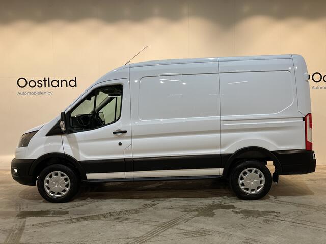 Ford E-Transit 350 L2H2 Trend 68 kWh / 100% Elektrisch !! / Airco / Cruise Control / CarPlay / Camera / Navigatie / 3-Zits / 11.500 KM !!