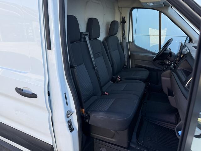 Ford E-Transit 68kWh 184PK L2H2 317km WLTP 96,1% (SOH) BEV Snelladen Camera Cruise control Climate control Carplay Navigatie Parkeersensoren