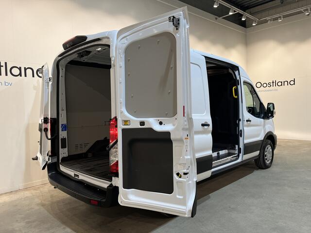 Ford E-Transit 390 (3500 kg) L2H2 Trend 68 kWh / 100% Elektrisch !! / Airco / Cruise Control / CarPlay / Camera / Navigatie / 3-Zits / 2.500 KM !!