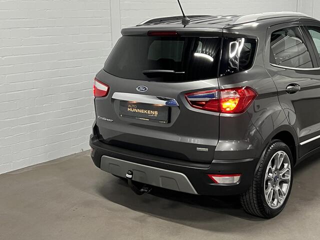 Ford ECOSPORT 1.0 EcoBoost Titanium Trekhaak | Open dak | Cruise control | Stuur-/Stoelverwarming | Carplay | Verwarmde voorruit | Navigatie | Bang & Olufsen
