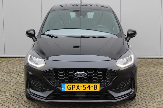 Ford FIESTA 1.0-125pk EcoBoost Mild-Hybrid ST-Line AUTOMAAT ! Gun uzelf het gemak, comfort en plezier van een automaat ! Volautm. airco, LED verlichting, navigatie, draadloze telefoonlader, stuur-, stoel- en voorraamverw., cruise control, parkeersensoren achter, lane