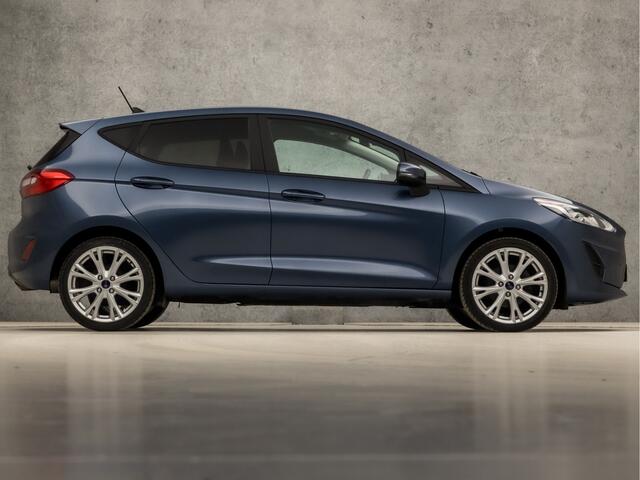 Ford FIESTA 1.0 EcoBoost Sport (APPLE CARPLAY, GROOT NAVI, STUUR/STOELVERWARMING, WITTE STIKSELS, SPORTSTOELEN, LANE ASSIST, GETINT GLAS, CRUISE, NIEUWE APK, NIEUWSTAAT)