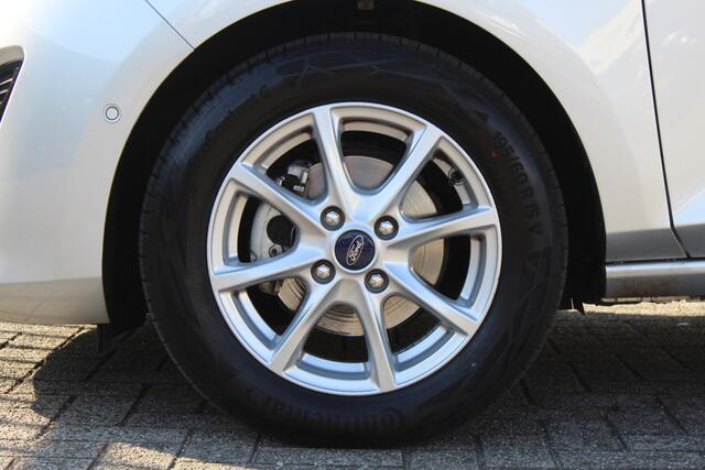 Ford FIESTA 1.0 EcoBoost Titanium Navigatie/Adaptive cruise control/Climate control/Lane assist/Apple carplay/Stoelverwarming/Stuurverwarming/Voorruitverwarming/Achteruitrijcamera/Parkeersensoren rondom/Dodehoek detectie/Keyless/Bluetooth/Lichtmetalen velgen.