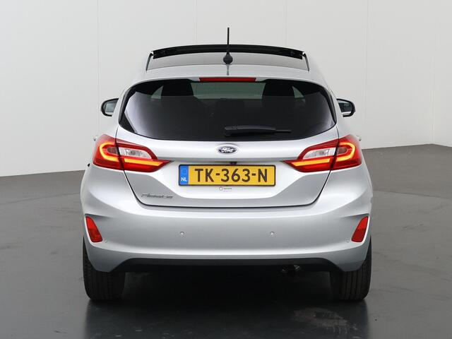 Ford FIESTA 1.0 EcoBoost Titanium | Panoramadak | Winterpakket | Parkeercamera | Climate Control | Cruise Control | Dodehoekdetectie |