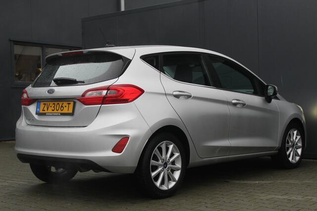 Ford FIESTA 1.0 EcoBoost Titanium | Incl. 12 maanden garantie | Cruise control | Climate control | Bluetooth | Lichtmetalen velgen | DAB+ | Navigatie | Airco