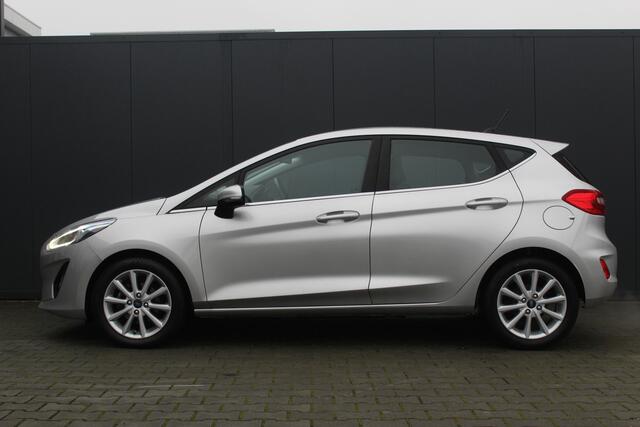 Ford FIESTA 1.0 EcoBoost Titanium | Incl. 12 maanden garantie | Cruise control | Climate control | Bluetooth | Lichtmetalen velgen | DAB+ | Navigatie | Airco
