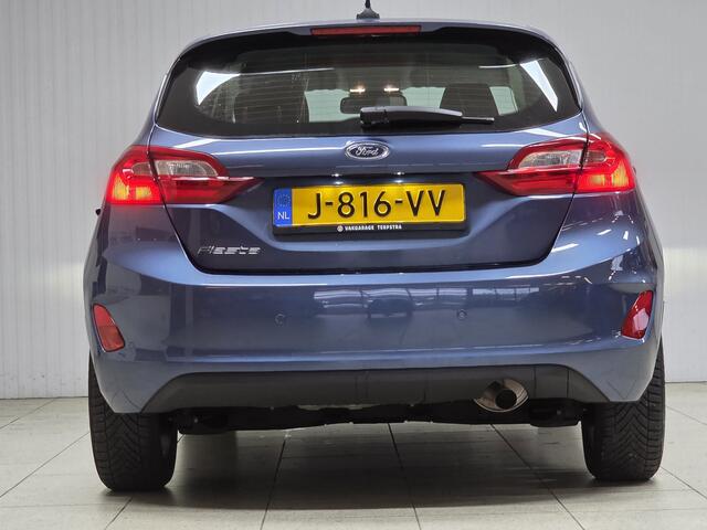 Ford FIESTA 1.0 EcoBoost Titanium/ 15'' LMV/ DAB+/ Lane-Assist./ 15'' LMV/ Clima/ Cruise/ Elek. pakket/ Isofix/ Bluetooth/ Armsteun/ Multi. LEDER. Stuur/ Mistl./ PDC/ LED Dagrijverl.