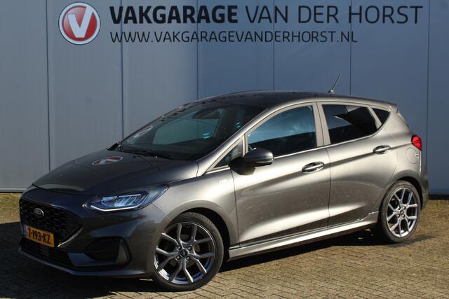 Ford FIESTA 1.0-125pk EcoBoost Mild-Hybrid ST-Line. Luxe, sportieve en goed onderhouden Fiesta ! Autm. airco, Cruise control, Lane assist, 17" Lmv, Parkeersensoren Achter, Metallic lak, Navigatie by Apple/Android, LED verlichting etc.