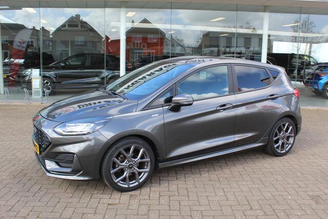 Ford FIESTA 1.0-125pk EcoBoost Mild-Hybrid ST-Line. Luxe, sportieve en goed onderhouden Fiesta ! Autm. airco, Cruise control, Lane assist, 17" Lmv, Parkeersensoren Achter, Metallic lak, Navigatie by Apple/Android, LED verlichting etc.