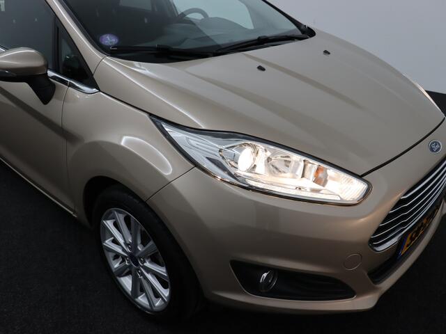 Ford FIESTA 1.0 EcoBoost Titanium Trekhaak, Bluetooth, Cruise control, Parkeersensor achter, Regensensor, Verwarmd voorruit, Lichtmetalen velgen 16, Ontdek deze sportieve en betrouwbare Ford Fiesta 1.0 EcoBoost Titanium uit 2017 met handgeschakelde transmissie. Dankz