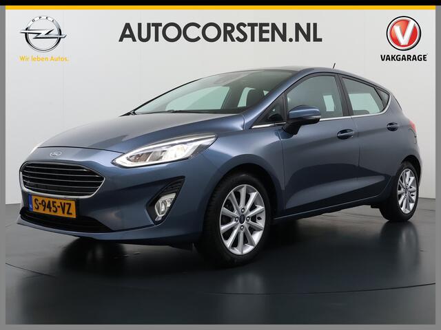 Ford FIESTA 1.0T 126PK Titanium Apple Carplay Android Navi LM Airco Cruise Control Stoelverwarming Apps Voorruitverwarming Wifi Mistlampen Chroompack TCS Led Lmv Lane Assist Isofix TCS EAB Hill-Start-Assist Ford-Pass-Connect LED