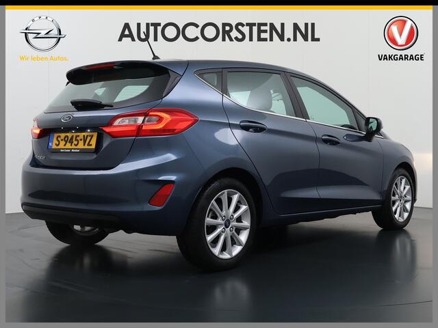 Ford FIESTA 1.0T 126PK Titanium Apple Carplay Android Navi LM Airco Cruise Control Stoelverwarming Apps Voorruitverwarming Wifi Mistlampen Chroompack TCS Led Lmv Lane Assist Isofix TCS EAB Hill-Start-Assist Ford-Pass-Connect LED
