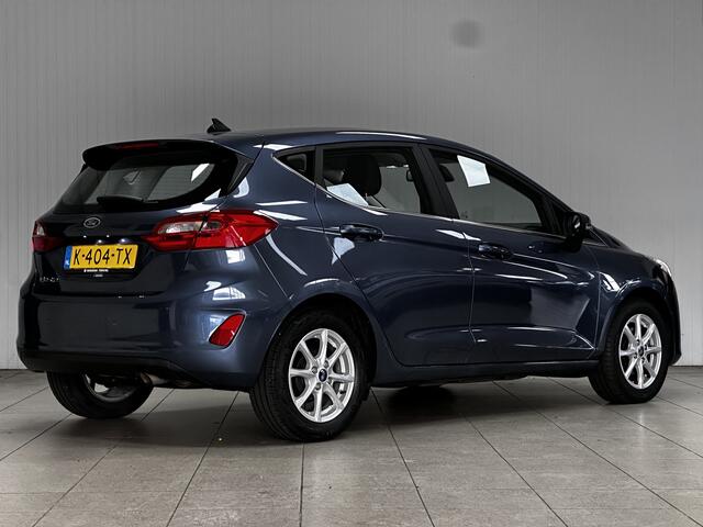 Ford FIESTA 1.0 EcoBoost Titanium/ 15'' LMV/ LED Koplampen/ DAB+/ Lane-Assist./ Clima/ Cruise/ Elek. pakket/ Isofix/ Bluetooth/ Multi. LEDER. Stuur/ Mistl./ PDC/ Chroom/ LED Dagrijverl.