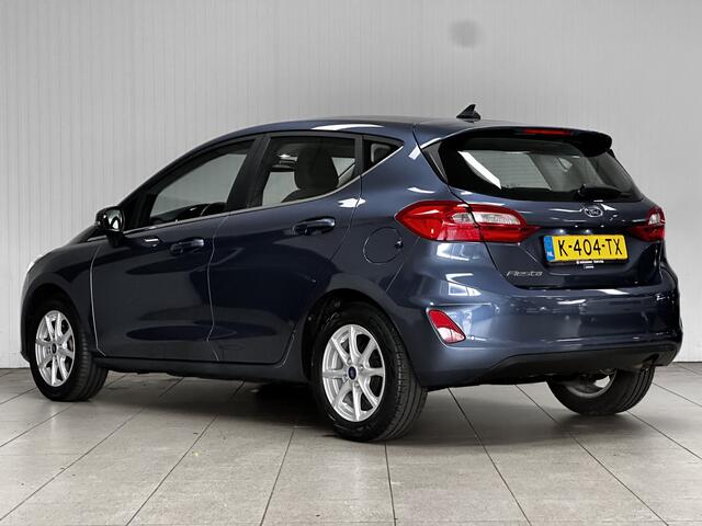 Ford FIESTA 1.0 EcoBoost Titanium/ 15'' LMV/ LED Koplampen/ DAB+/ Lane-Assist./ Clima/ Cruise/ Elek. pakket/ Isofix/ Bluetooth/ Multi. LEDER. Stuur/ Mistl./ PDC/ Chroom/ LED Dagrijverl.