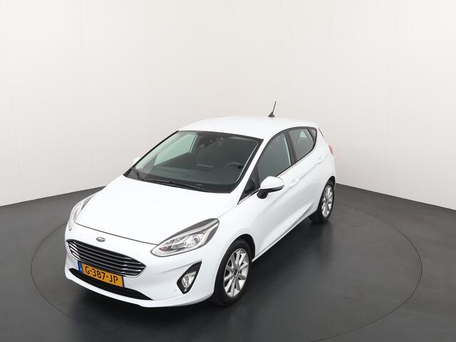 Ford FIESTA EcoBoost 100pk Titanium | Verwarmde voorruit | Camera | Navi | Cruise | All Season | Apple Carplay | Parkeersensoren |
