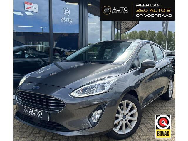 Ford FIESTA 1.0 EcoBoost Titanium 101PK | 1e Eigenaar! | Dealeronderhouden | NL AUTO | AUTOMAAT | Trekhaak | Achteruitrijcamera | B&O Audio | Navigatie | Climate Control | Adaptive Cruise Control | Voorruitverwarming | Parkeersensoren Voor en Achter |