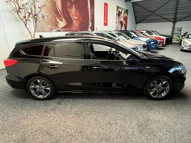Ford FOCUS Wagon 1.0 EcoBoost ST Line Business NAVIGATIE CRUISE CONTROL APPLE CARPLAY/ANDROID STUUR EN VOORRUITVERWARMING ACHTERUITRIJCAMERA KEYLESS GO ZEER MOOI !! LOCATIE 3010