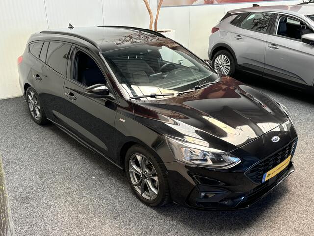 Ford FOCUS Wagon 1.0 EcoBoost ST Line Business NAVIGATIE CRUISE CONTROL APPLE CARPLAY/ANDROID STUUR EN VOORRUITVERWARMING ACHTERUITRIJCAMERA KEYLESS GO ZEER MOOI !! LOCATIE 3010