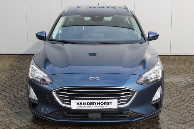 Ford FOCUS Wagon 1.0-125pk EcoBoost Mild-hybrid Titanium. Mooie, ruime, luxe en comfortabele Ford Focus wagon. Volautm. airco dual, camera, stoel-, stuur- en voorraamverw., easy entry/easy go, cruise control, Isofix, side- en lane assist, parkeersensoren v+a, LM wie
