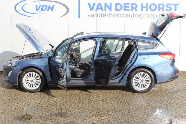 Ford FOCUS Wagon 1.0-125pk EcoBoost Mild-hybrid Titanium. Mooie, ruime, luxe en comfortabele Ford Focus wagon. Volautm. airco dual, camera, stoel-, stuur- en voorraamverw., easy entry/easy go, cruise control, Isofix, side- en lane assist, parkeersensoren v+a, LM wie