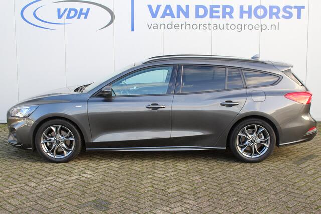 Ford FOCUS Wagon 1.0-125pk EcoBoost ST-Line AUTOMAAT ! Heel erg nette en goed onderhouden Ford Focus ST-Line wagon automaat. Volautm. airco dual, stoel-, stuur- en voorraamverw., camera, trekhaak, navigatie, telefoonvoorb., LM wln, cruise cntrl, skiluik etc., etc...