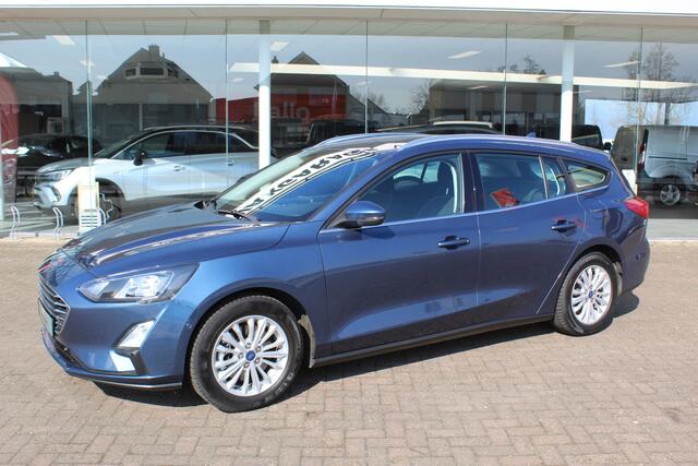 Ford FOCUS Wagon 1.0-125pk EcoBoost Mild-hybrid Titanium. Mooie, ruime, luxe en comfortabele Ford Focus wagon. Volautm. airco dual, camera, stoel-, stuur- en voorraamverw., easy entry/easy go, cruise control, Isofix, side- en lane assist, parkeersensoren v+a, LM wie