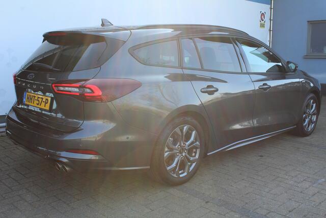 Ford FOCUS Wagon 1.0 EcoBoost Hybrid ST Line | Achteruitrijcamera | Stoel/stuur verwarming | Navigatie | Climate controle | Adaptive cruise controle | Lane assist | Apple CarPlay/Android Auto | Keyless start | Dodehoeksensoren | Parkeersensoren V+A | Zwarte hemelbe
