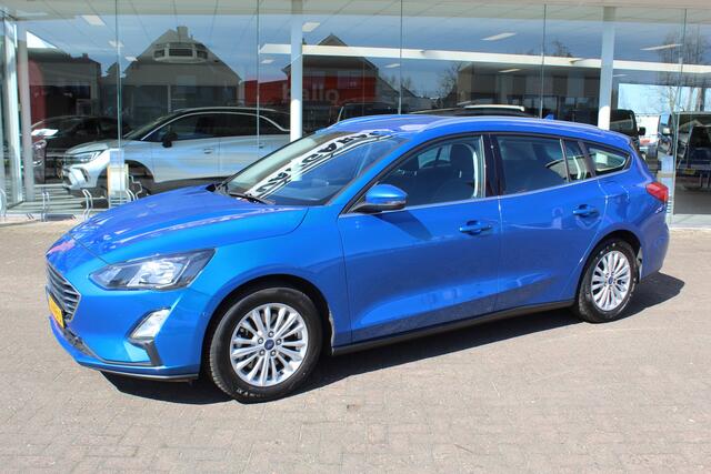 Ford FOCUS Wagon 1.0-125pk EcoBoost Mild-Hybrid Titanium. Mooie, ruime, luxe en comfortabele Ford Focus wagon. Volautm. airco dual, camera, stoel-, stuur- en voorraamverw., easy entry/easy go, cruise control, Isofix, side- en lane assist, parkeersensoren v+a, LM wie