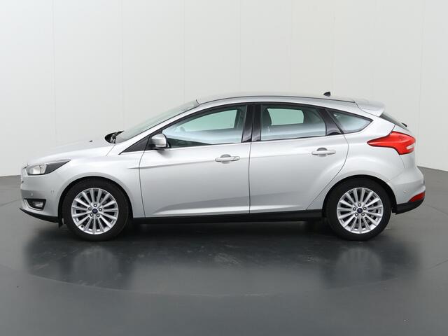 Ford FOCUS 1.0 Titanium | Trekhaak | Navigatie | Voorruitverwarming | Parkeersensoren | 17| Lichtmetalen Velgen |