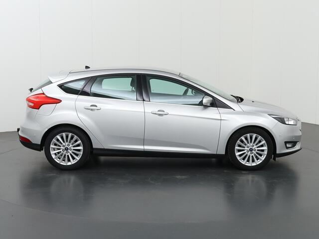 Ford FOCUS 1.0 Titanium | Trekhaak | Navigatie | Voorruitverwarming | Parkeersensoren | 17| Lichtmetalen Velgen |