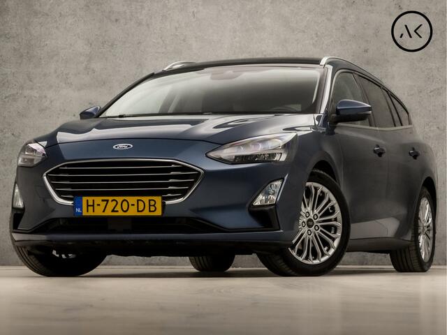 Ford FOCUS Wagon 1.0 EcoBoost Titanium Business Automaat (PANORAMADAK, APPLE CARPLAY, GROOT NAVI, STUUR/STOELVERWARMING, GETINT GLAS, ADAPTIVE CRUISE, TREKHAAK, PARKEER ASSISTENT, NIEUWE APK, NIEUWSTAAT)