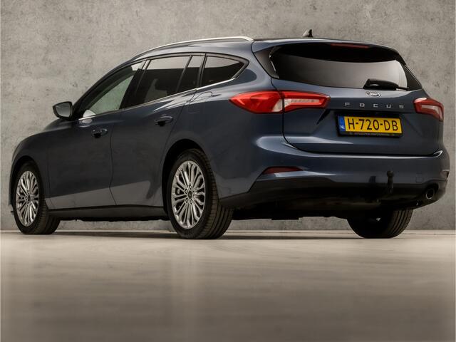 Ford FOCUS Wagon 1.0 EcoBoost Titanium Business Automaat (PANORAMADAK, APPLE CARPLAY, GROOT NAVI, STUUR/STOELVERWARMING, GETINT GLAS, ADAPTIVE CRUISE, TREKHAAK, PARKEER ASSISTENT, NIEUWE APK, NIEUWSTAAT)
