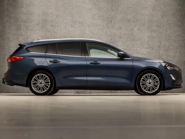 Ford FOCUS Wagon 1.0 EcoBoost Titanium Business Automaat (PANORAMADAK, APPLE CARPLAY, GROOT NAVI, STUUR/STOELVERWARMING, GETINT GLAS, ADAPTIVE CRUISE, TREKHAAK, PARKEER ASSISTENT, NIEUWE APK, NIEUWSTAAT)