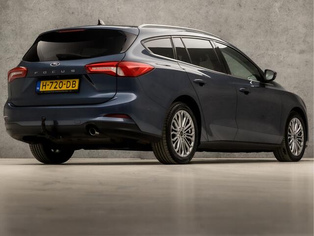 Ford FOCUS Wagon 1.0 EcoBoost Titanium Business Automaat (PANORAMADAK, APPLE CARPLAY, GROOT NAVI, STUUR/STOELVERWARMING, GETINT GLAS, ADAPTIVE CRUISE, TREKHAAK, PARKEER ASSISTENT, NIEUWE APK, NIEUWSTAAT)