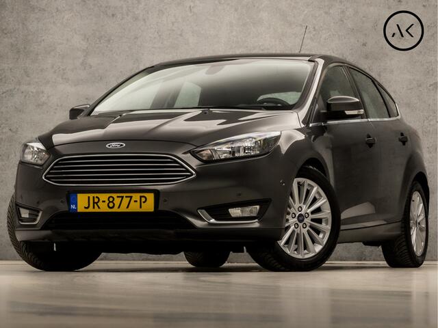Ford FOCUS 1.0 Titanium Sport (GROOT NAVI, CLIMATE, STOELVERWARMING, SPORTSTOELEN, TREKHAAK, LM VELGEN, PARKEERSENSOREN, NIEUWSTAAT)