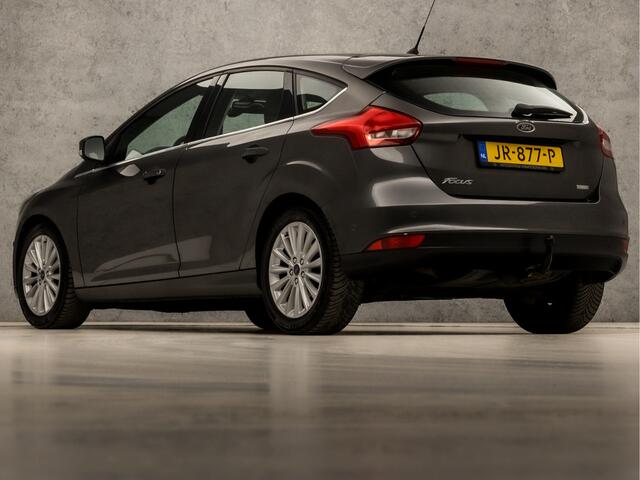 Ford FOCUS 1.0 Titanium Sport (GROOT NAVI, CLIMATE, STOELVERWARMING, SPORTSTOELEN, TREKHAAK, LM VELGEN, PARKEERSENSOREN, NIEUWSTAAT)