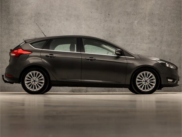 Ford FOCUS 1.0 Titanium Sport (GROOT NAVI, CLIMATE, STOELVERWARMING, SPORTSTOELEN, TREKHAAK, LM VELGEN, PARKEERSENSOREN, NIEUWSTAAT)