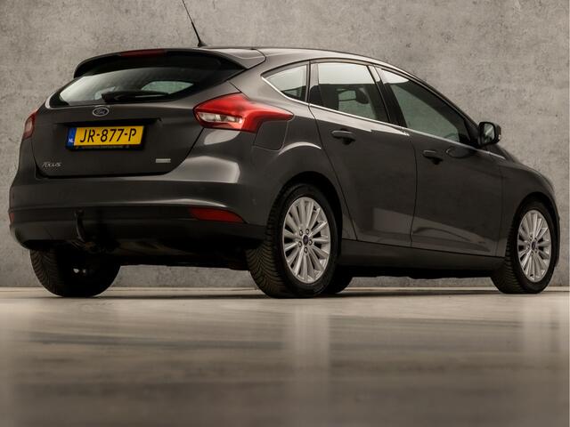 Ford FOCUS 1.0 Titanium Sport (GROOT NAVI, CLIMATE, STOELVERWARMING, SPORTSTOELEN, TREKHAAK, LM VELGEN, PARKEERSENSOREN, NIEUWSTAAT)