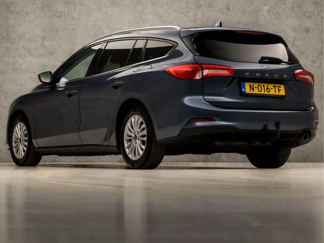 Ford FOCUS Wagon 1.0 EcoBoost Titanium X Business Automaat (VIRTUAL COCKPIT, APPLE CARPLAY, STUUR/STOELVERWARMING, ADAPTIVE CRUISE, SPORTSTOELEN, GETINT GLAS, CAMERA, TREKHAAK, NIEUWE APK, NIEUWSTAAT)