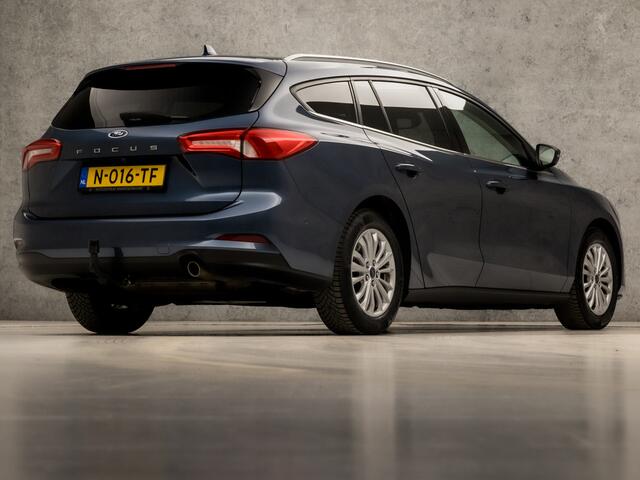Ford FOCUS Wagon 1.0 EcoBoost Titanium X Business Automaat (VIRTUAL COCKPIT, APPLE CARPLAY, STUUR/STOELVERWARMING, ADAPTIVE CRUISE, SPORTSTOELEN, GETINT GLAS, CAMERA, TREKHAAK, NIEUWE APK, NIEUWSTAAT)